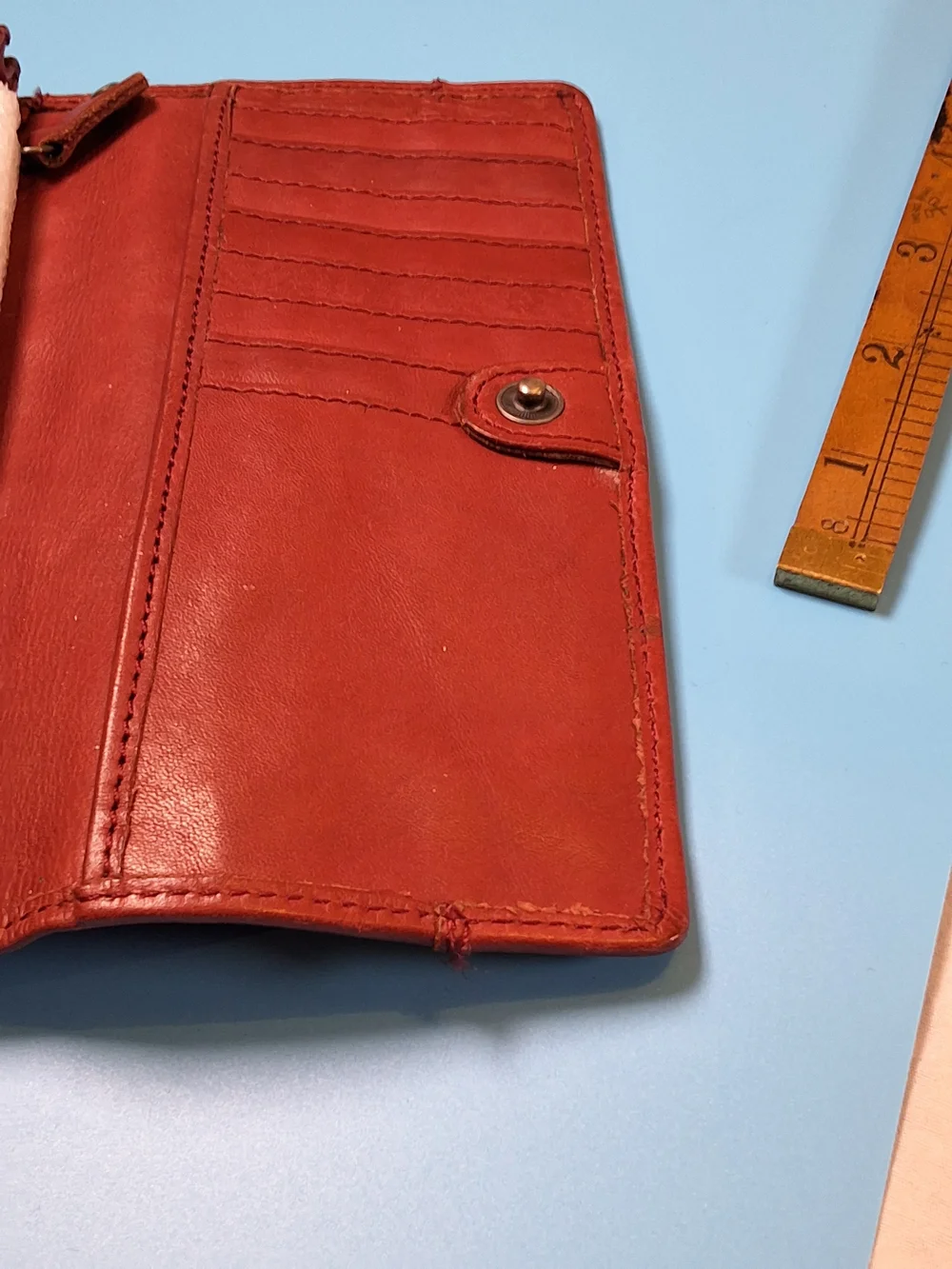 Sag Harbor Red Leather Clutch Wallet with Metal Logo